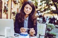 Woman at cafe with fever.