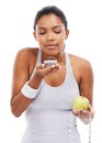 Woman, cake and fruit choice diet or smell dessert for weight loss, nutrition decision or balance food. Female person