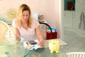 Woman calculate housekeeping allowance