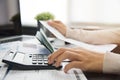 Woman calculating her Debt. Royalty Free Stock Photo