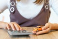 Woman calculating money with car insurance concept and calculator. Royalty Free Stock Photo