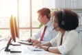 Operator woman agent with headsets working in a call centre Royalty Free Stock Photo