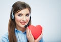 Woman call center operator hold love symbol Red heart. Close up Royalty Free Stock Photo