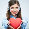 Woman call center operator hold love symbol Red heart. Close up Royalty Free Stock Photo