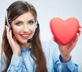 Woman call center operator hold love symbol Red heart. Close up Royalty Free Stock Photo