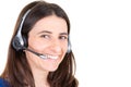 Woman in call center smiling happy cheerful support operator portrait in phone headset Royalty Free Stock Photo