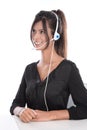 Woman in a call center - support operator with a headset, isolated on white Royalty Free Stock Photo