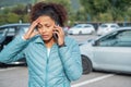 Woman call roadside service after fender bender car crash Royalty Free Stock Photo