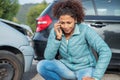 Woman call roadside service after fender bender car crash Royalty Free Stock Photo