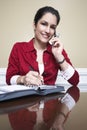 Woman On Call Taking Notes Royalty Free Stock Photo