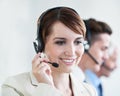 Woman, callcenter and phone call, CRM or contact us with headset and mic, coworking and smile for communication. Telecom Royalty Free Stock Photo