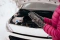 Woman calling for help or assistance - winter car breakdown Royalty Free Stock Photo