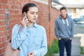 Woman Calling For Help On Mobile Phone Whilst Being Stalked On C Royalty Free Stock Photo