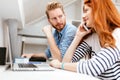 Woman calling partner from office