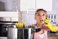 Woman Calling Plumber To Fix Water Leaking From Ceiling Royalty Free Stock Photo