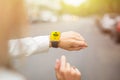 Woman calling taxi using her smartwatch