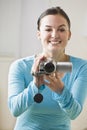 Woman with Camcorder Royalty Free Stock Photo
