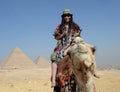 Woman on camel back Royalty Free Stock Photo