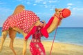 Woman with camel Royalty Free Stock Photo