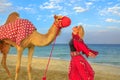 Woman with camel Royalty Free Stock Photo