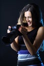 Woman with camera looking at great shot