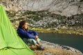 Woman Camper Watching Sunset