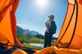 Woman camping in mountains Royalty Free Stock Photo