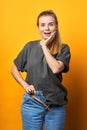 Woman can`t button her jeans because of her big belly. Royalty Free Stock Photo