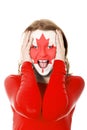 Woman with Canada flag on face. Royalty Free Stock Photo