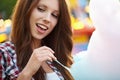 Woman with candy floss Royalty Free Stock Photo