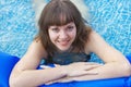 Woman is by a canicular day in a pool Royalty Free Stock Photo