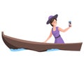 Woman in canoe or gondola taking self photo on smartphone. Girl rides boat and making selfie Royalty Free Stock Photo