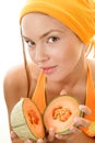 Woman with cantaloupe Royalty Free Stock Photo