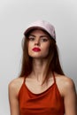 Woman with a cap Look forward cropped view of the model on her head red lips Royalty Free Stock Photo