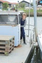 woman captain arriving to harbor Royalty Free Stock Photo
