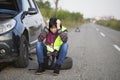 Woman car broke down on the empty road Royalty Free Stock Photo