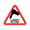 Woman car driver sticker. Female in automobile warning sign. Lady hairdryer in red triangle to a vehicle glass.