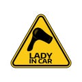 Woman car driver sticker. Female in automobile warning sign. Lady hairdryer in yellow triangle to a vehicle glass.