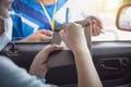 Woman in car paying gasoline with credit card, female holding debit card payment at gas station. Petrol oil loyalty mileage point Royalty Free Stock Photo