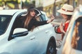 Woman from the car shows indecent gesture. Royalty Free Stock Photo