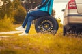 Woman on a car struck a wheel on the picturesque road