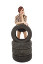 Woman with a car tyre