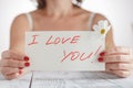 Woman with card I love You on white background Royalty Free Stock Photo