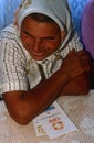 A woman with a CARE handbook in Kosovo.