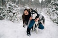 Woman caresses the Husky dog Royalty Free Stock Photo