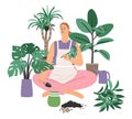 Woman caring for Houseplants. Domestic orangery and care concept. Gardening hobby