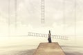 Woman carries her personal ladder to climb into the sky Royalty Free Stock Photo