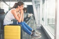 Woman carries your luggage at the airport terminal