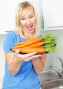 Woman with carrot Royalty Free Stock Photo