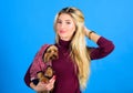 Woman carry yorkshire terrier. Girl attractive blonde hug cute dog. Apparel and accessories. Pet supplies. Dressing your